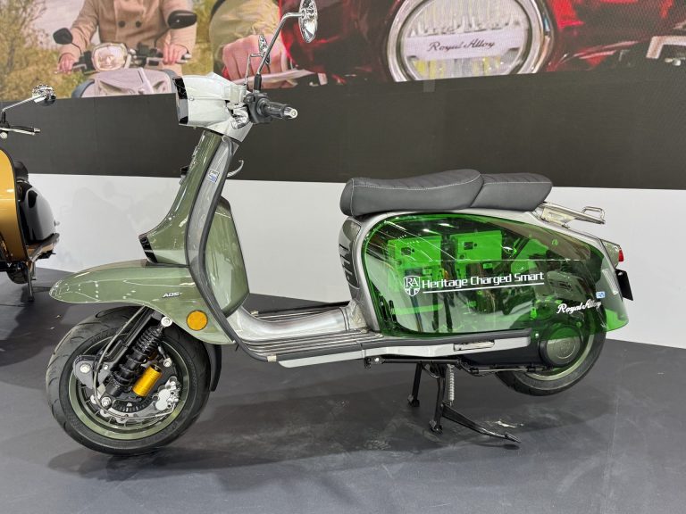 Royal Alloy GP400EV on a show stand, with a transparent green side panel showing the battery packs inside