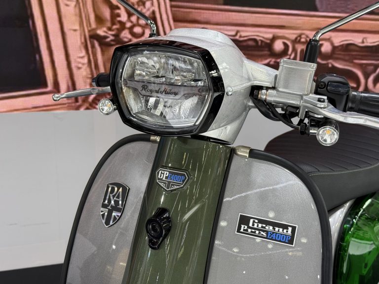 Front of the GP400EV, with its LED headlamp and GP400EV badge